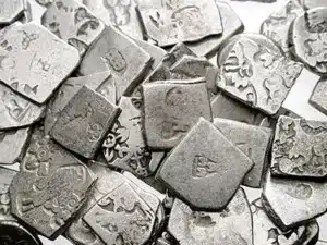 Collection of Mauryan punch-marked coins (Ahat coins) from the Mauryan period.