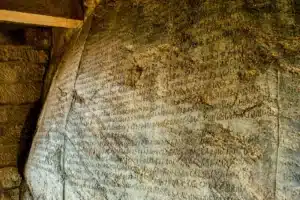 13th Rock Edict of Ashoka inscribed on a large stone, showcasing Ashoka's edict on his moral and social reforms.
